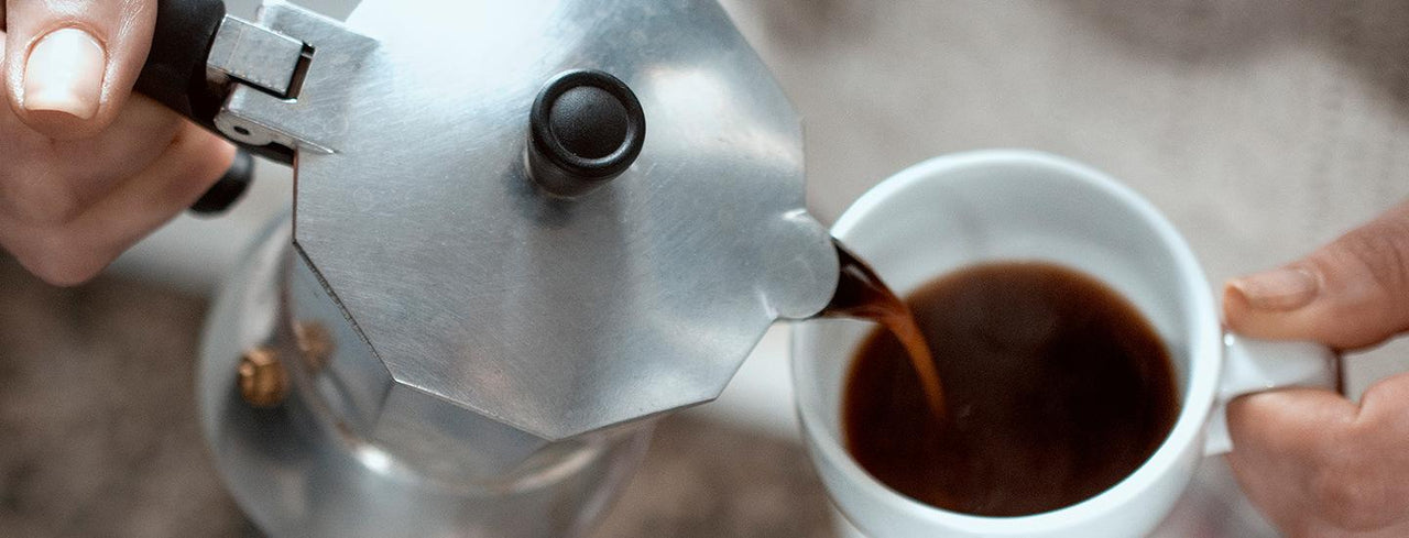 Person Pouring Coffee