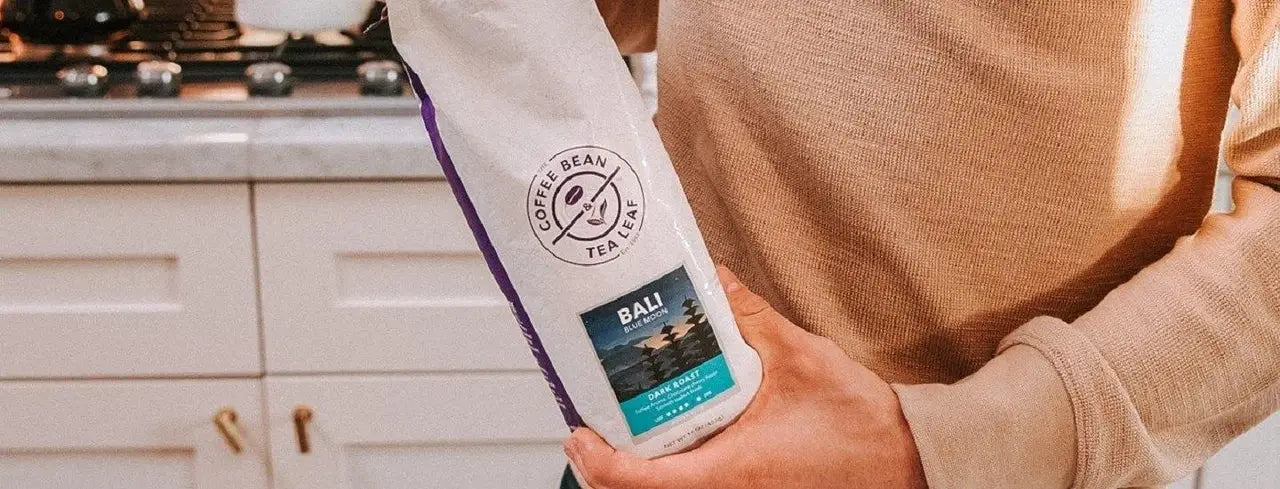 Person Holding Coffee Bag