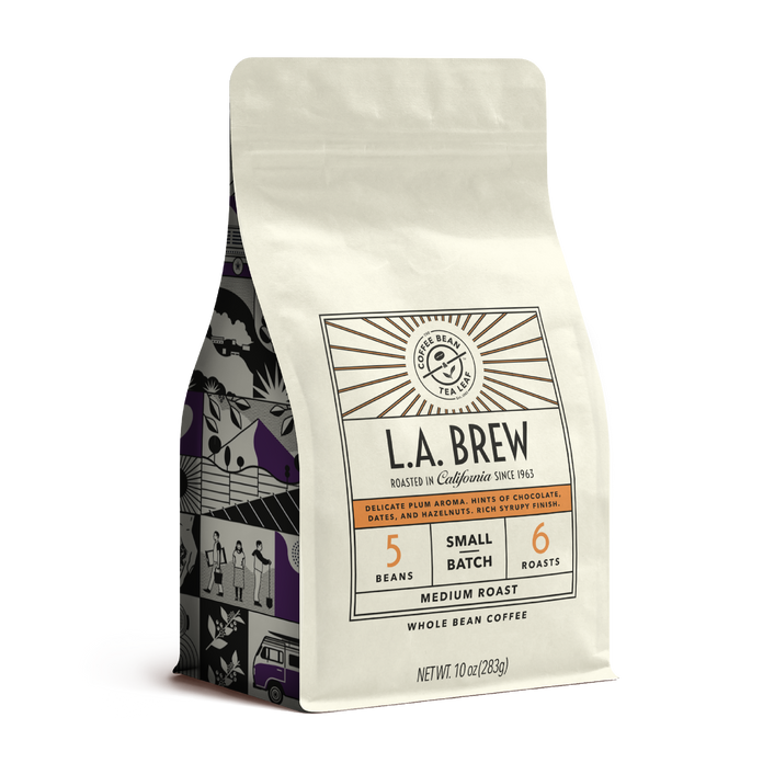 10oz cream bag labeled “L.A. Brew” on a white background. The design shows the coffee is Roasted in California, has a delicate plum aroma with hints of chocolate dates and hazelnut with a rich syrupy finish and is Medium, Ground.