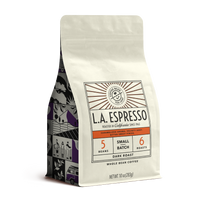 10oz cream bag labeled “L.A. Espresso” on a white background. The design shows the coffee is Roasted in California and has a Bold & Distinctive taste and is Dark, Ground Coffee.