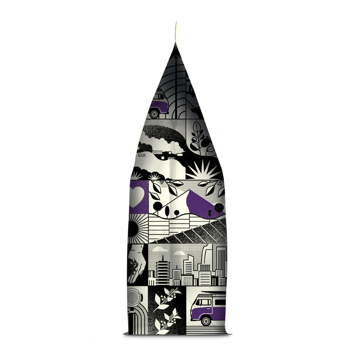 Side of coffee packaging with decorative design showing city skylines, buses and plants
