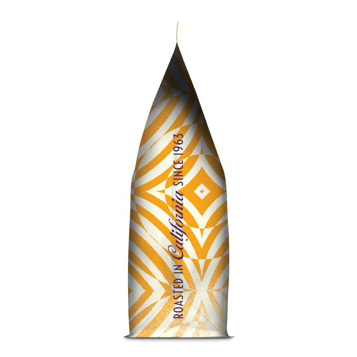 Side of coffee packaging with decorative design and text that reads “Roasted in California Since 1963” on white background