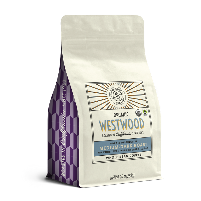 10oz cream bag labeled “Westwood” on a white background. The design shows the coffee is Roasted in California and has a Bold & Distinctive taste and is Medium-Dark, Ground Coffee.