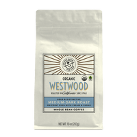 10oz cream bag labeled “Westwood” on a white background. The design shows the coffee is Roasted in California and has a Bold & Distinctive taste and is Medium-Dark, Ground Coffee.