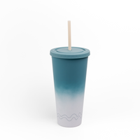 A tall insulated tumbler with a lid and straw, featuring a blue-to-white gradient design and a subtle wave pattern near the bottom, shown on a plain white background.
