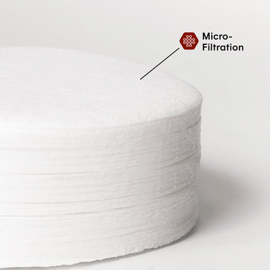 White cylindrical filter with 'Micro-Filtration' label on a white background