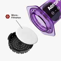 Aeropress coffee maker component with micro-filtration feature on a white background