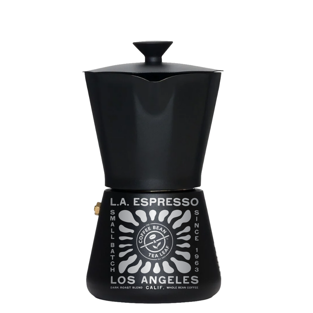 Black metal coffee maker with a lid and white design that reads 'L.A. Espresso, Small Batch, Since 1963, Los Angeles' featuring a stylized sunburst and coffee bean logo in the center.