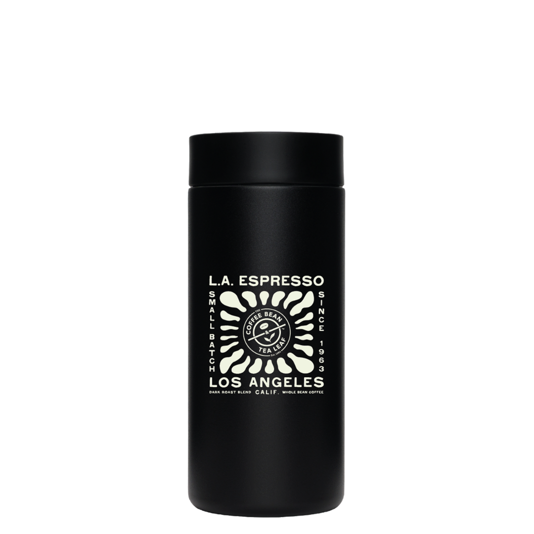 Black tumbler with a lid and white design that reads 'L.A. Espresso, Small Batch, Since 1963, Los Angeles' featuring a stylized sunburst and coffee bean logo in the center