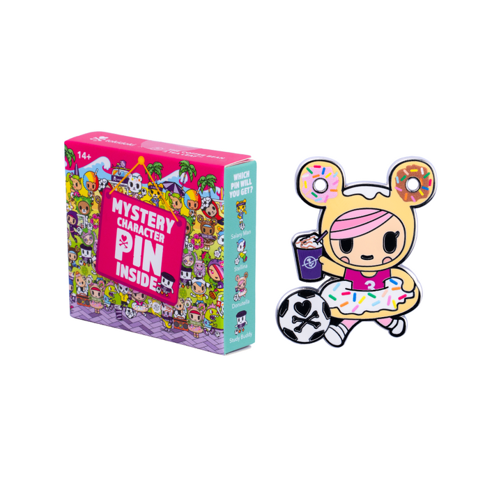 Mystery Character Pin Box with animated tokidoki characters next to an enamel pin of a tokidoki character with drink in hand and kicking a soccer ball
