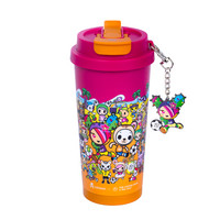 Coral colored tokidoki tumbler with flip lid, shows animated tokidoki characters on a beach